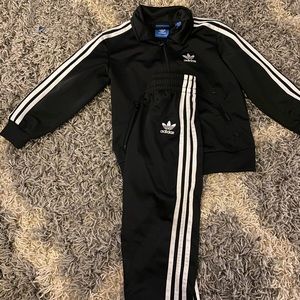 Adidas three stripe track suit